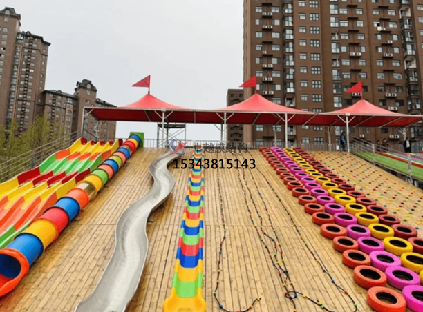 濮陽(yáng)滑世界橘紅色<font color='red'>張拉膜結(jié)構(gòu)</font>生產(chǎn)